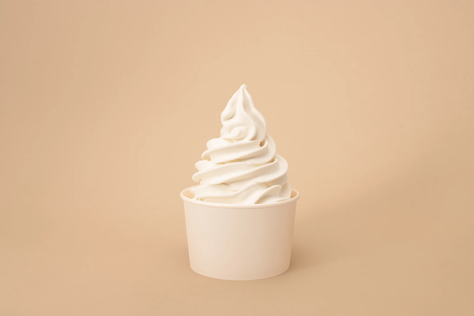 Soft serve with chocolate sauce and crisp toppings